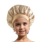 Bonnet en satin enfant – Douceur et protection des cheveux fragiles