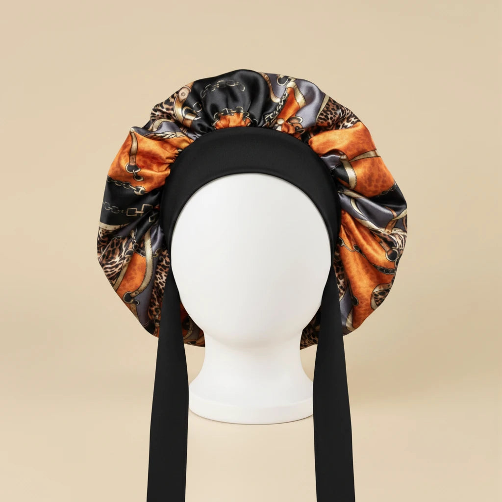 Bonnet de nuit en satin à attaches coloris Motif chaînes orange — packshot premium