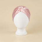 Bonnet de nuit en satin drapé, coloris rose clair