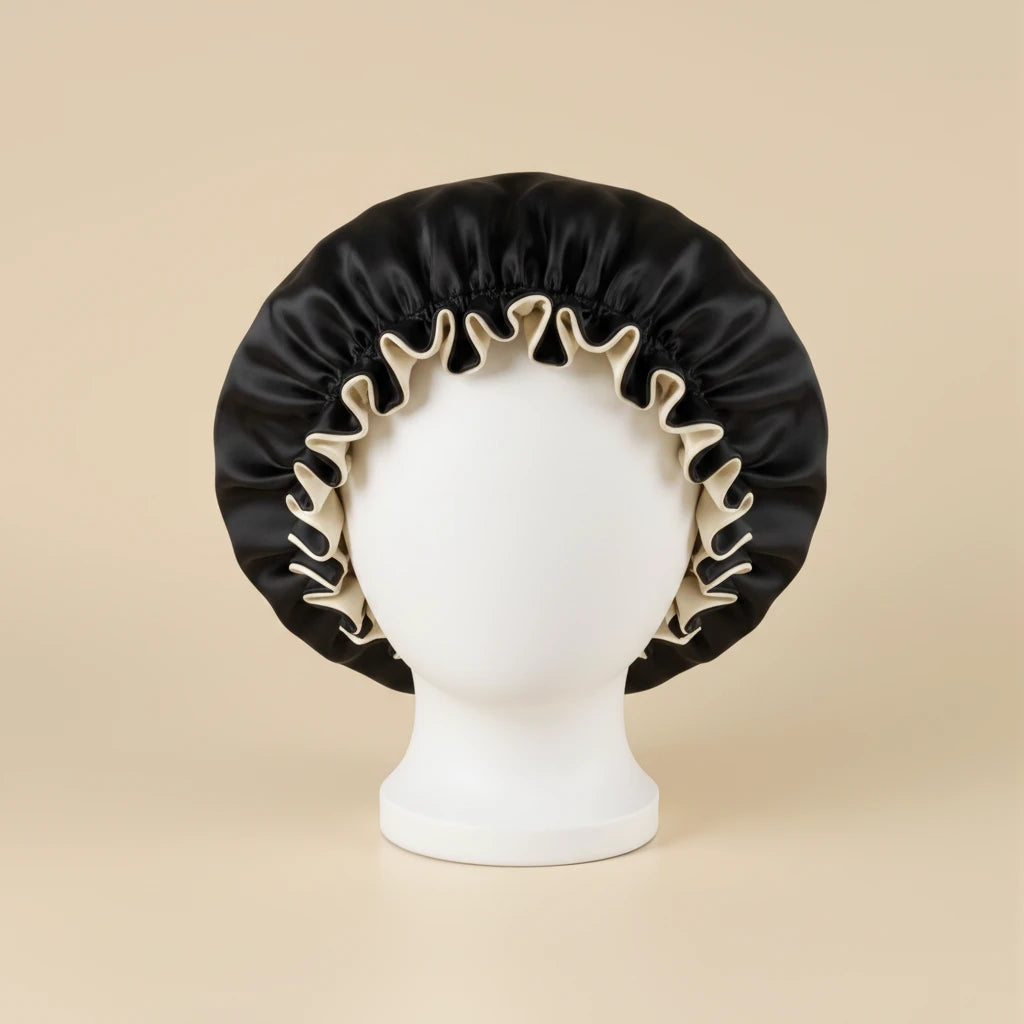 Bonnet de nuit en satin réversible deux couleurs coloris Noir — packshot premium