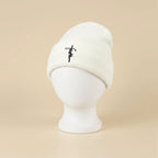 Bonnet d'hiver en maille doublé satin, coloris blanc