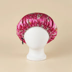 Bonnet en satin bébé motif liberty, coloris rose