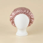 Bonnet en satin grand volume pour cheveux bouclés coloris Rose — packshot premium