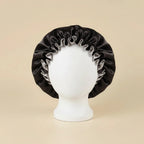 Bonnet en satin pour cheveux bouclés coloris Noir — packshot premium