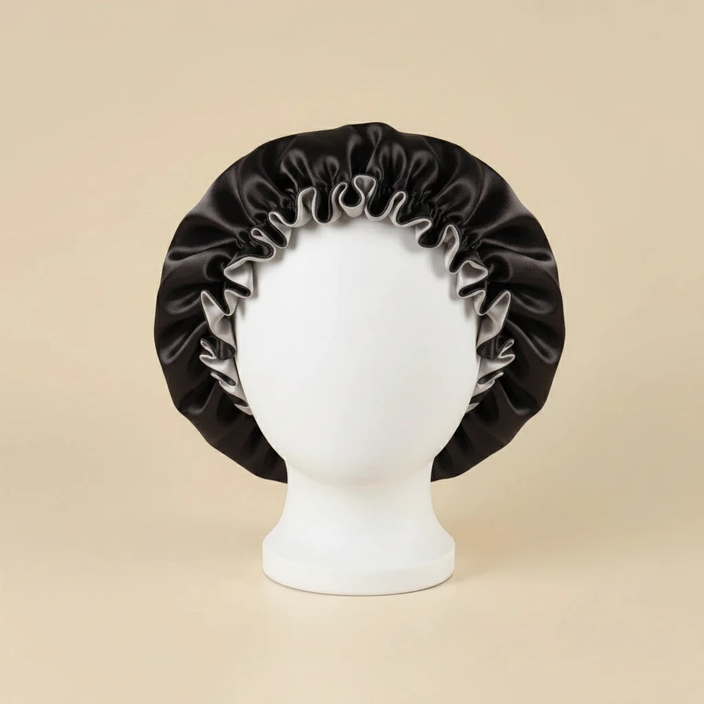 Bonnet en satin pour cheveux bouclés coloris Noir — packshot premium