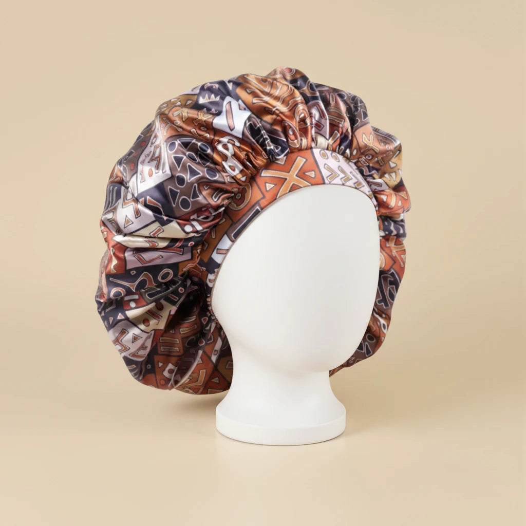 Bonnet en satin motif ethnique, coloris orange