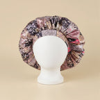 Bonnet en satin motif ethnique, coloris rose