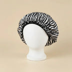 Bonnet en satin à motifs pour cheveux crépus coloris Zébré noir et blanc — packshot premium
