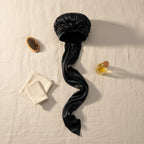 Bonnet en satin pour cheveux longs, coloris noir