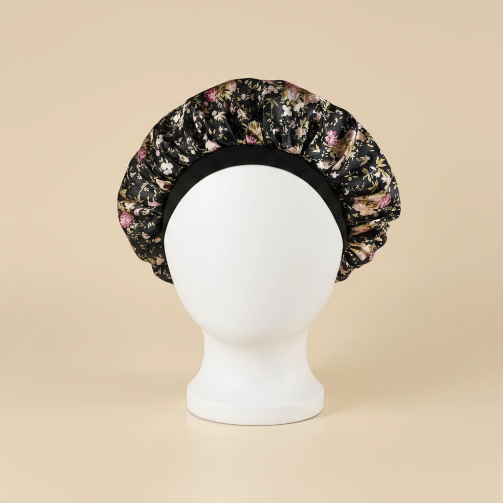 Bonnet en satin enfant motif floral, coloris noir