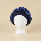 Bonnet satin enfant luxe coloris bleu marine, packshot premium