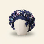 Bonnet en satin bébé motif licorne coloris Bleu marine — packshot premium