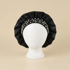 Bonnet en satin à bande perlée, coloris noir